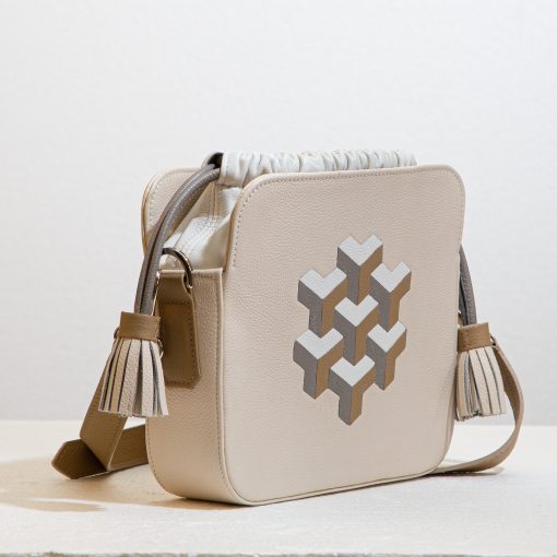 Cross body drawstring bag with leather marquetry design