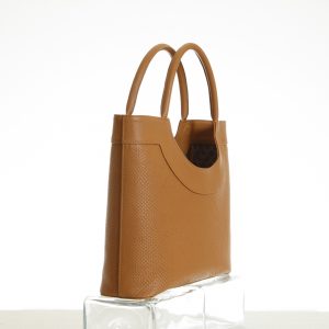 Tote bag detail in tan embossed leather