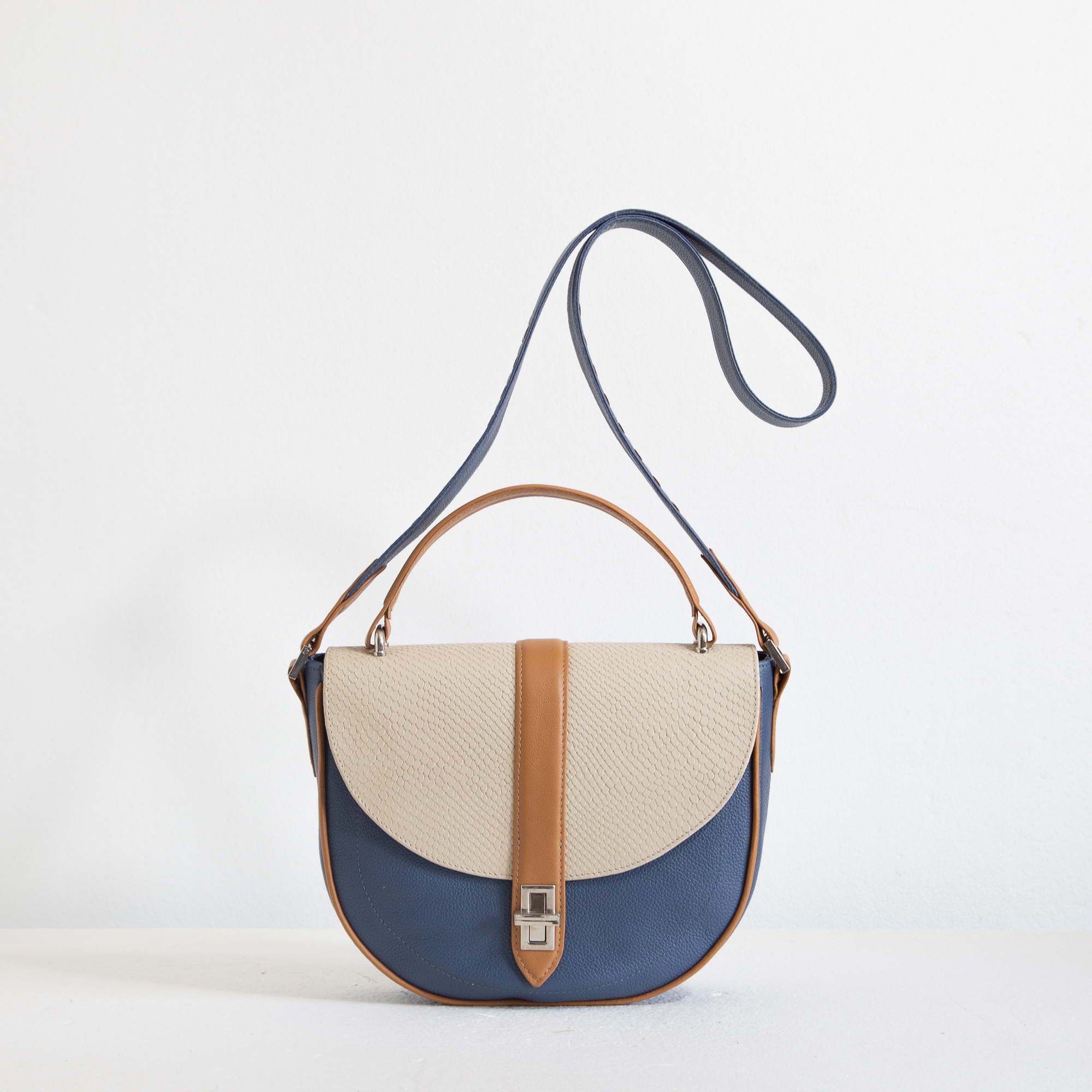 Leather half moon shaped handbag with top handle