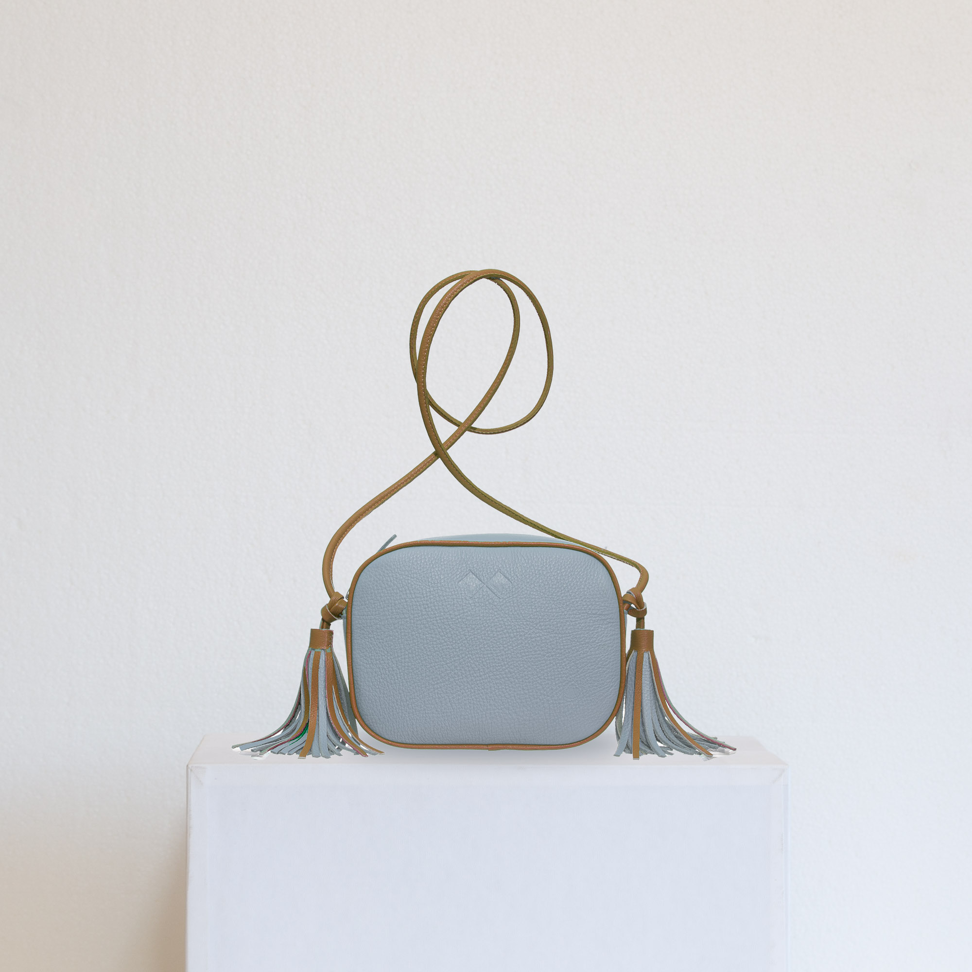 Small crossbody bags with tassles